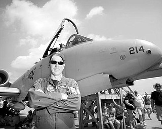 John O'Brien, an alumni of Cardinal Mooney, stands before his A-10 Warthog as a member of the 103 Fighter Squadron from the Willow Grove Naval Air Reserve Station in Philadelphia PA, during the Thunder Over the Valley Air Show on Sunday afternoon.
Geoffrey Hauschild