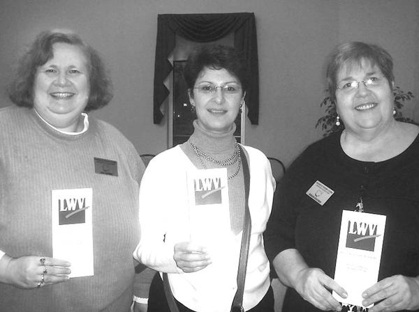Special to The Vindicator
SIGN UP: The League of Women Voters of Greater Youngstown is launching a membership campaign. Displaying membership applications available to men and women interested in local, state and national government issues are from left, V. Annie Harpman, Suzanne Barbati and Kathleen Dragoman. For more information on becoming a member, contact Dragoman at (330) 793-1901 or sbcglobal.net. Information about the league is available on the Web at www.lwvgy.org.                               
