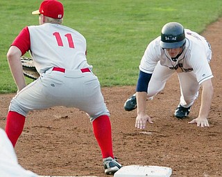 Scrappers Kyle Bellows dives back to 1rst ahead of the throw. Cyclones 1st baseman is Sam Honeck.