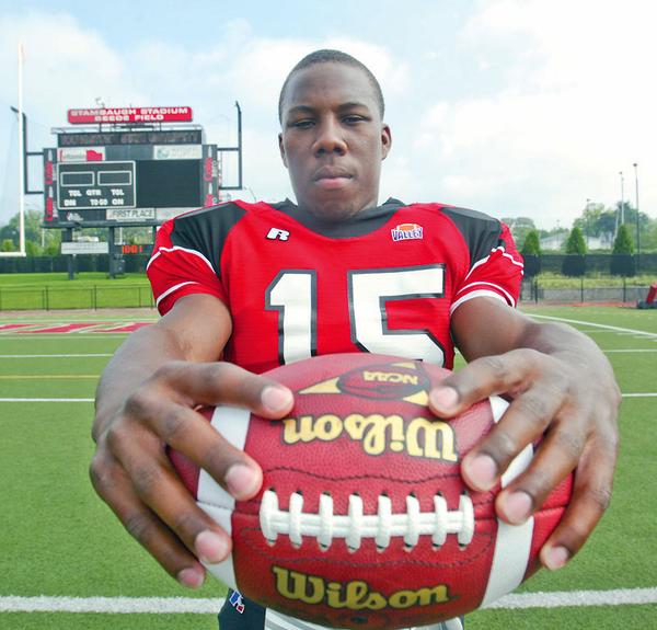 Taylor Hill at football photo day at YSU.