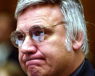 Rep. James Traficant, D-Ohio arrives on Capitol Hill Monday, July 15, 2002 before the House Ethics Committee. In an uphill fight to keep from becoming only the second House member expelled from Congress since the Civil War, Traficant opened his second defense this week against official misconduct. He was convicted in court of bribery, tax evasion and racketeering charges