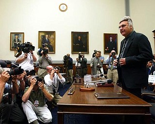 Rep. James Traficant, D-Ohio, arrives on Capitol Hill in Washington, Monday, July 15, 2002 to testify before the House Ethics Committee. In an uphill fight to keep from becoming only the second House member expelled from Congress since the Civil War, Traficant opens his second defense this week against the bribery, tax evasion and racketeering charges he was convicted of in court.