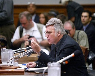 Rep. James Traficant, D-Ohio, testifies on Capitol Hill in Washington, Monday, July 15, 2002 before the House Ethics Committee. In an uphill fight to keep from becoming only the second House member expelled from Congress since the Civil War, Traficant opens his second defense this week against the bribery, tax evasion and racketeering charges he was convicted of in court.