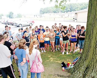 A candlelight vigil at Brookfield High School Sunday for 15-year-old Robert Flynn.