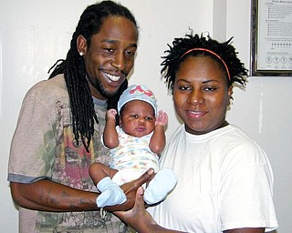 PROUD PARENTS: Albert Jenkins and Laketha Anderson, both of Youngstown, hold their son, Albert IV, who was born July 24 at Forum Health Northside Medical Center. They will be making sure to get their son immunized with the required number of shots before he reaches age 3.