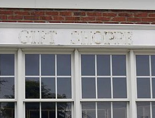 SIGNS OF THE TIMES: The economic downturn has made it more difficult to find tenants for retail property, such as this building at McKinley Way and Main Street in Poland.