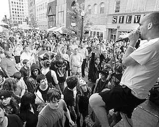 The Vindicator/Robert K. Yosay -----
VEXFEST 6 - -Andrew Lenhart bangs out another song at VexFest 6 on Federal Plaza 9-23-2009