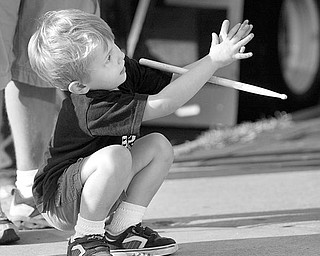 The Vindicator/Robert K. Yosay -----
VEXFEST 6 - Boy in the Band Richard Yaist -4- plays with a drum stick he got from the band he was there with Lisa and Will his parents from youngstown - 9-23-2009