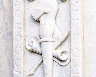 The original marble memorial with the High School Name etched in it.