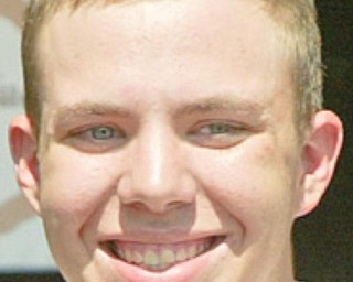 2009 Canfield Fair 4H queenMegan Day, 19 of Berlin Center and king Nathan Suchy, 17, of Jackson Milton. WDLEWIS