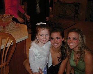 Attending the Canfield High School Sweethearts dinner dance in 2007 were, from left, Nicole Strock, Ashley McCluskey and sister Alex Strock.
