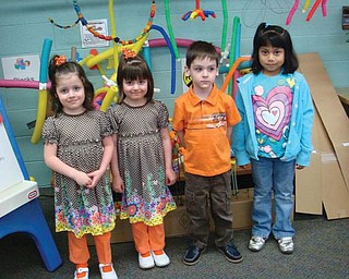 Members of the Vari-Coppola family attending preschool open house at St. Paul's in New Middletown this spring included 4-year-old triplets Lily, Carli and Patrick with big sister Kate.                               