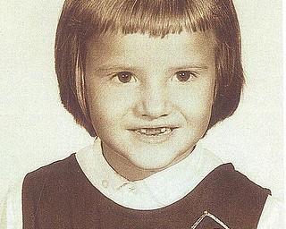 This is Maureen Welsh Schrecengost of Hubbard when she was in first grade at St. Rose School in Girard.