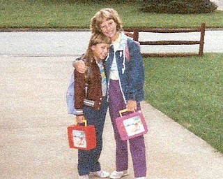 On the first day of school at Watson Elementary in Austintown in 1988, Dr. Amy Toth Dahl is pictured with her and sister, Chrissy Toth, who was 30 years old yesterday.