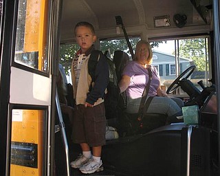 On his first day of kindergarten last year, Jacob Woods appears to be thinking, 'Hey, Mom, aren't you coming too?' Jacob attends Stadium Drive Elementary in Boardman. 