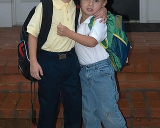 Brothers Nicholas (6) and Alex (3) LaPlante are shown on their first day of school last year. Nick was starting Kindergarten at Holy Family in Poland, and Alex was beginning his first year of preschool at the Davis YMCA.
