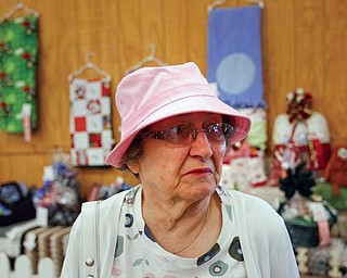 The Vindicator/Robert K. Yosay -----BUCKET LIST CHECK OFF - Eleanor Kalasky was asked by her son to come to the fair after 20 years.. abscence.. she always loved the fair and the crafts as she toured the fine arts bldg.
--942009-