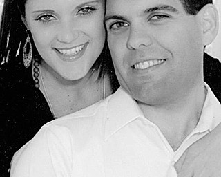 Courtney E. Alderman and John Finizio III