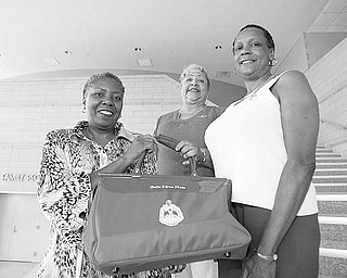 The Vindicator/Robert K. Yosay ---l-r Lynette Sutton Nikki Davis Marcia Haire- Ellis at the Delta Sigma Theta Black Excellence Awards -- 08252009-
