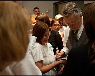 The Vindicator/Geoffrey Hauschild
Jim Traficant speaks, signs autographs, and takes photographs with supporters at Mr. Anthony's on Sunday evening.
9.6.2009