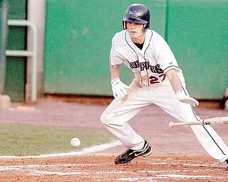 Mahoning Valley Scrapper Jordan Henry bunts the ball during the bottom of the third inning at Eastwood Field only to be thrown out by the Brooklyn Cyclones on his way to first base.