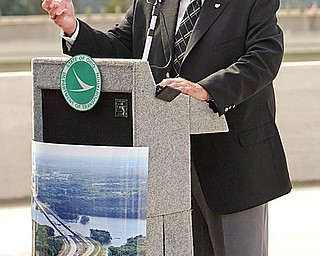 LONG PROCESS: Ken Carano, Mahoning Valley regional director for Gov. Ted Strickland, was an Austintown trustee when talk of widening the twin Iinterstate 80 bridges over Meander Reservoir began. The project began in April 2006 and opens next week.