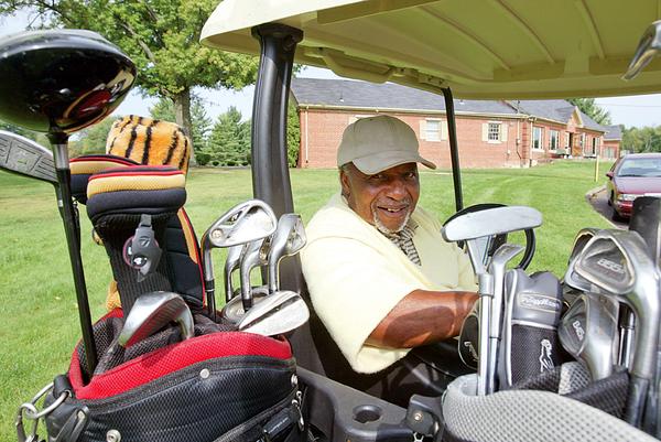 A QUICK CLOSING: The Youngstown-owned Henry Stambaugh Golf Course was closed for only one day — Saturday — as the city tries to save money. Al Campbell, 81, a retired steel worker from Youngstown, waits to play nine holes at the course. He plays there almost every day.