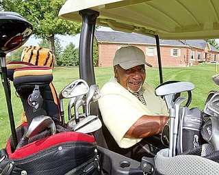A QUICK CLOSING: The Youngstown-owned Henry Stambaugh Golf Course was closed for only one day — Saturday — as the city tries to save money. Al Campbell, 81, a retired steel worker from Youngstown, waits to play nine holes at the course. He plays there almost every day.