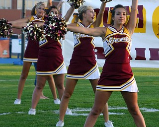 South Range cheerleaders Danielle Pendice, Jordan Stear, Alex DeRose and Lauren McEwan are ready to start the game.