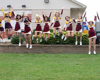 The South Range Cheerleaders are jumping for joy over the start of
football season!