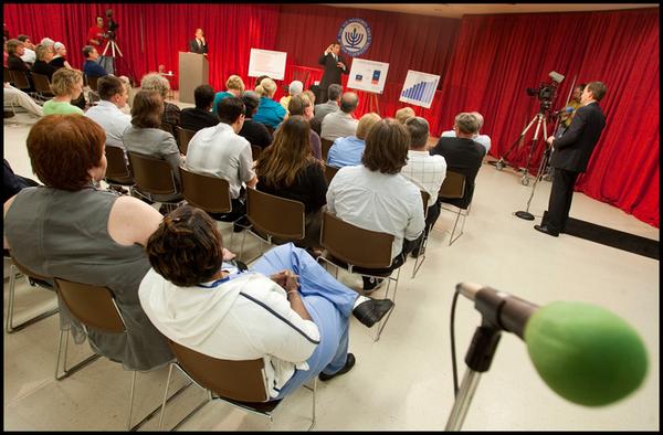 The Vindicato/Geoffrey HauschildCongressman Tim Ryan responds to a question from Bob Shroder, President and CEO of Humility of Mary Health Partners, (right) during a discussion on the current health care bill at the JCC on Monday evening. 9.14.2009