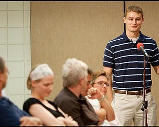 John Breedlove addresses Congressman Tim Ryan during the Health Debate at the Jewish Community Center in Youngstown Monday evening. 
