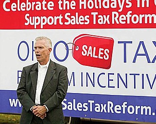 SALES TAX REFORMER: Bill Johnson of Poland, executive director of the Ohio Sales Tax Reform Incentive, speaks to supporters in Coitsville Township about a sales-tax-holiday bill that was introduced in the Ohio Statehouse.
