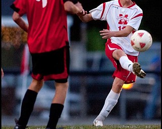 The Vindicator/Geoffrey HauschildMathew'sMike Ponikvar (13) kicks a pass during the second half of a game at Mathews on Thursday evening. The game ended in a tie 1-1.9.24.2009