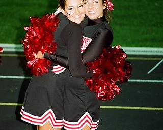Seniors Giovanna Delgarbino and Julia Guerrieri celebrate Girard 
Indians win over JFK