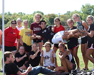 Canfield High School cross country teammates  pose for a photo after the Spartan Invitational.
Go Cards!