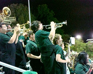 Ursuline Band member, Chris Colley plays the trumpet during the Ursuline vs. Bedford game on Sept. 18.
