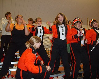 Do the Dance: Members of the Springfield Local Marching Band dance the night away to the sounds of the Drumline at the Springfield-Lisbon game.
 