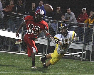 CRESTVIEW - COLUMBIANA - (8) Jacob Danks lays out for the ball as (32) Mardell Halas plays defense during their game Friday night. - Special to The Vindicator/Nick Mays