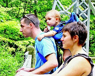 Jodi, John and 11 month old Evan Kelly of Youngstown, were out for a stroll on the Suspension Bridge