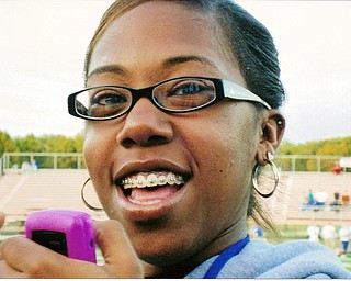 Fabulous Fan: Senior student, Summer Luckey, texting the game to a friend!