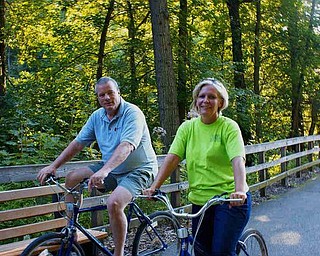 Tim and Ingrid Cassidy of Boardman stopped to chat before heading off across the Lanterman Falls Bridge