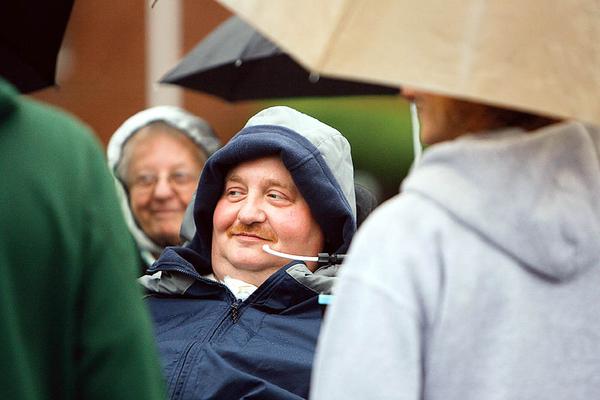 A HAPPY SITE: Joe Kaluza comes to Ivanhoe Avenue to see the site for his new home. Ground was broken Wednesday for the house, which will be disabled-accessible. Kaluza, the former manager at a KFC restaurant on South Avenue, was shot by a robber in March 2008 while he was leaving the store to make a bank deposit. The shooting left him a quadriplegic. Volunteers are building the house.