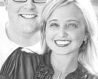 Atty. John R. Payne and Amber N. Metz