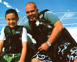 Nicholas Workman, 9, and Scott Workman were parasailing in Madeira Beach, Fla., in June.