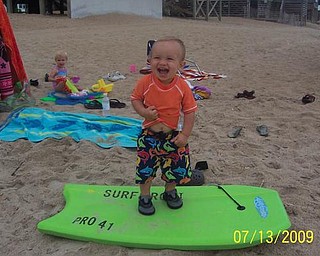 1-year-old Cooper Martz was 'surfing' in the Outer Banks.