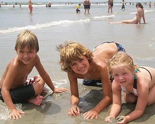 Alec, Ivan and Ava Bosnjak of Boardman are at Myrtle Beach, N.C. in August.
