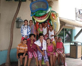 Top, from left, Aaliyah, Lilly ,Selena, Dawon and Rodney; and, bottom, from left, Tony, Elena, Jazmynlee, Briana, India and Giovanni are all enjoying their vacation at Splash Lagoon.