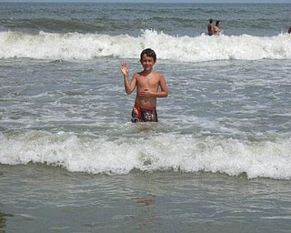 Kyle Mamounis, 9, was on vacation in Florida in July with his grandparents. This was his first time in the Atlantic Ocean, at Cocoa Beach.