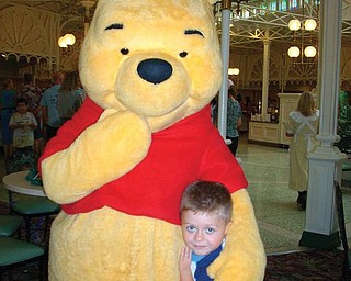Nicholas Colbert enjoyed some time with Winnie the Pooh after a fabulous lunch at the Crystal Palace in Walt Disney World this past summer.
